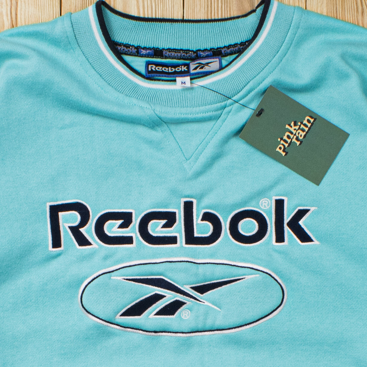 (M) Vintage Reebok Spell Out Embroidered Sweatshirt